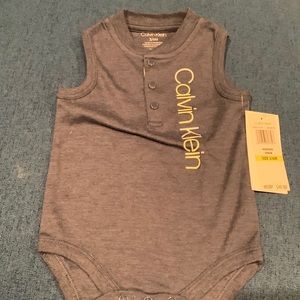 Calvin Klein onesie 3/6 months no sleeves